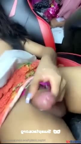 Hot singer Rihanna jerks to an orgasm and licks up her cum