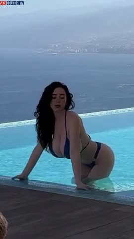 Billie Eilish's big boobs sway in the pool. FAKE