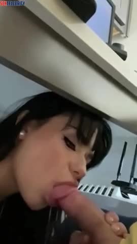 AI Penelope Menchaca giving a blowjob under the table