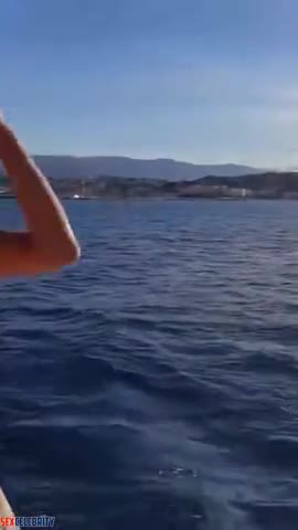 AI Jackie Guerrido modeling in the sea breeze